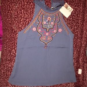 Blue top with tags